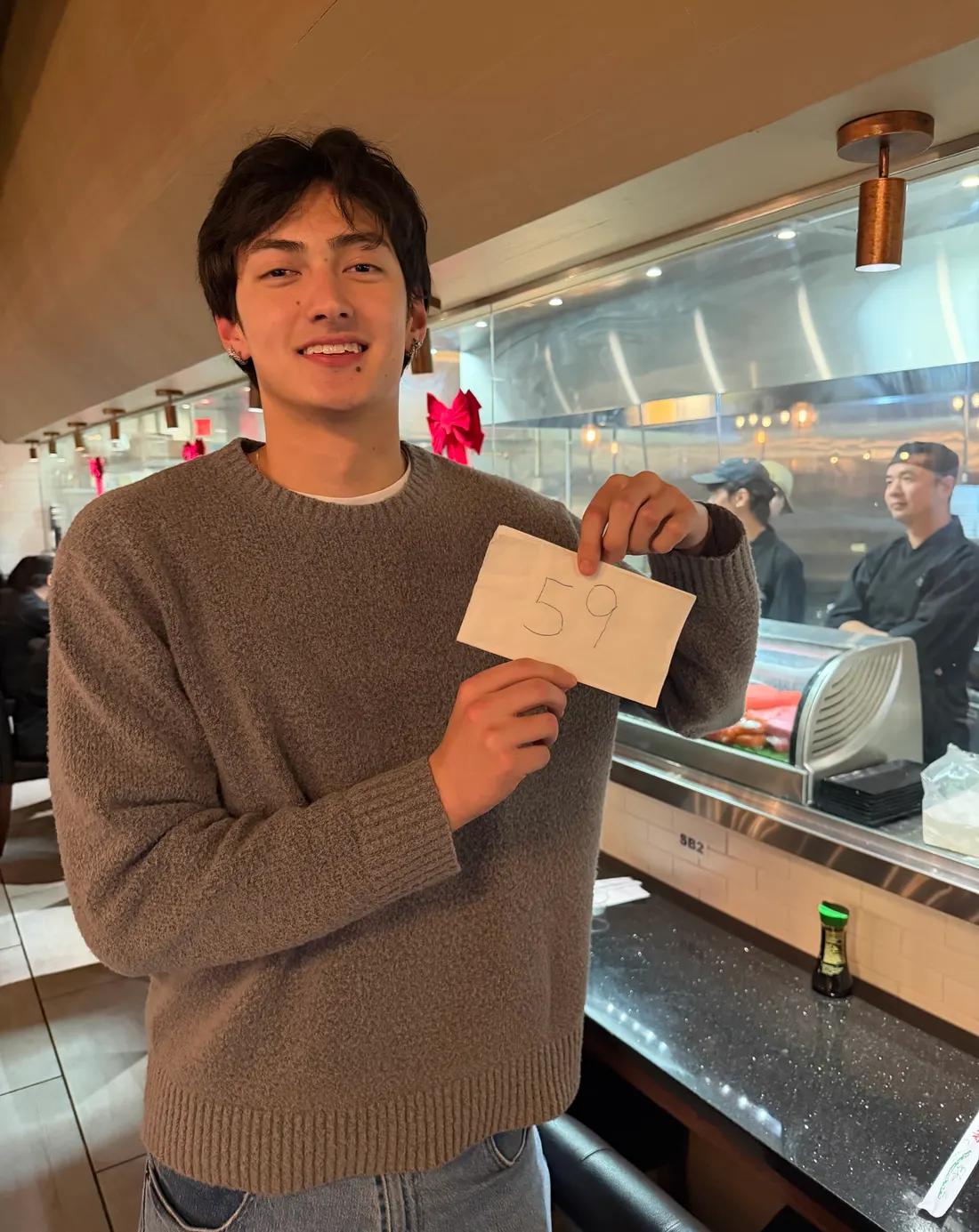 Eli Turner holding a design model